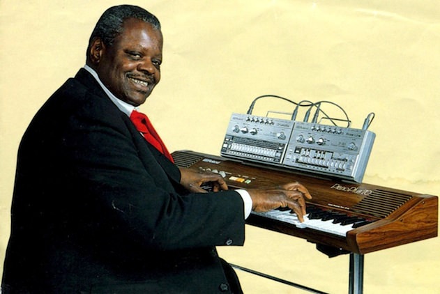 Jazz legend Oscar Peterson showing off Roland's intended use for the TB-303 and TR-606