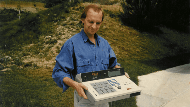 Roger Linn "holding an MPC60 prototype and making an odd face"